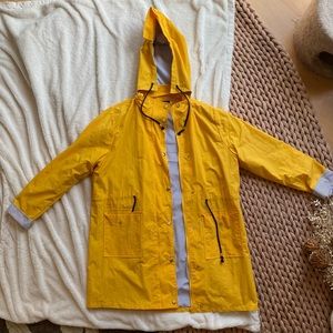 Kim Rodgers curvy yellow white and navy blue rain jacket